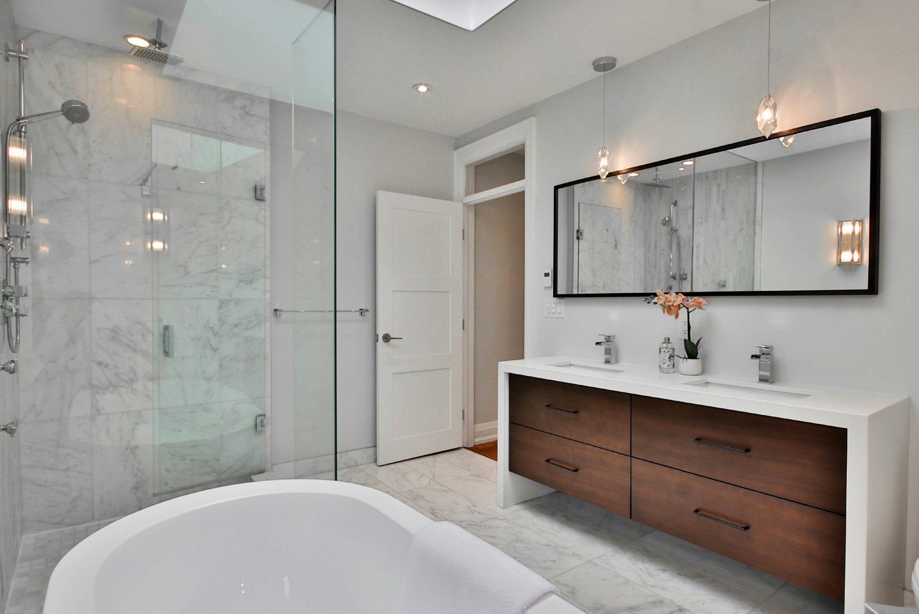 Bathroom remodeling inspiration with shower tile, vanity design, and coordinated finishes