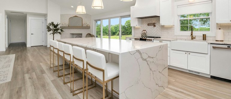Quartz and natural stone countertop slabs in Sacramento showroom